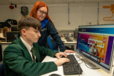 Jamie Doherty from St. Mary's Limavady gets help with his application form from Louise Nash, Senior Admissions Officer, at the Apprentice Showcase at Greystone campus.